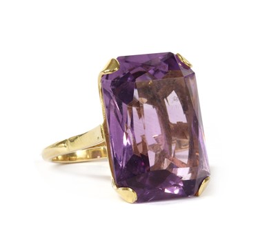 Lot 1249 - A gold single stone amethyst ring