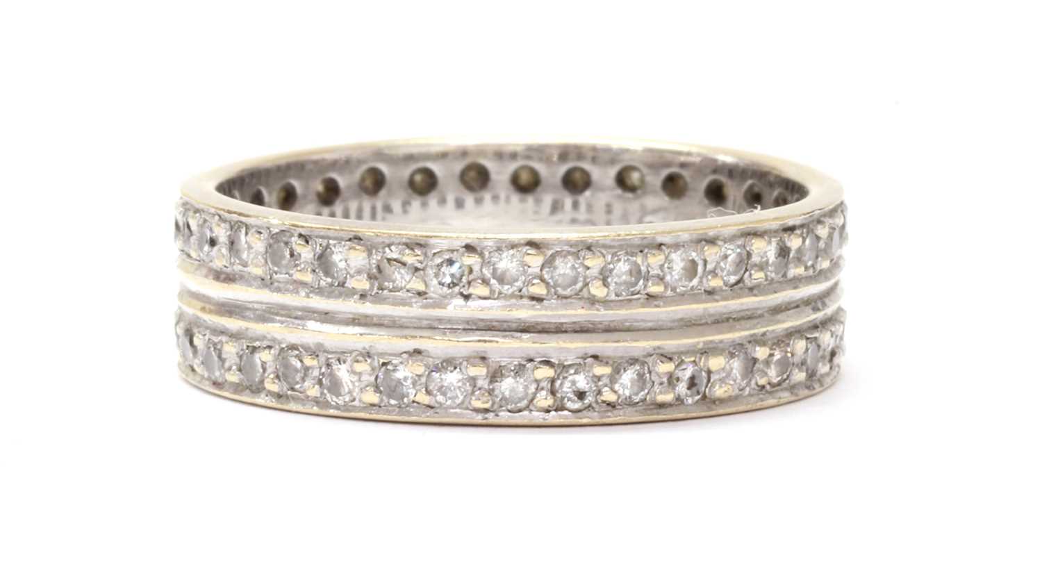 Lot 46 - A white gold two row diamond set full eternity ring