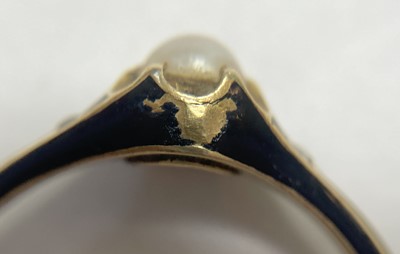 Lot 1003 - A Victorian gold enamel, split pearl and diamond memorial ring