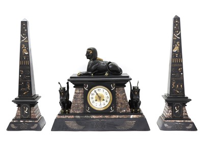 Lot 53 - An Egyptian Revival marble and slate mantel clock garniture
