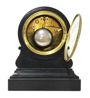Lot 13 - A black marble drumhead mantel clock