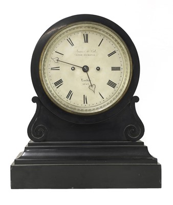 Lot 13 - A black marble drumhead mantel clock