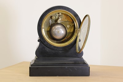 Lot 13 - A black marble drumhead mantel clock
