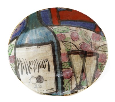 Lot 402 - A Dart Pottery 'Millennium Party' charger