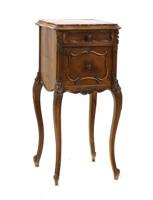 Lot 329 - A French Louis XV-style walnut bedside cupboard