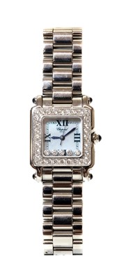 Lot 332 - A ladies' stainless steel diamond set Chopard 'Happy Sport' quartz bracelet watch, c.2005