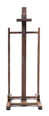 Lot 154 - A limed oak artist's easel