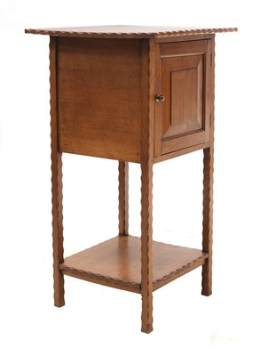 Lot 155 - An Arts and Crafts oak bedside cupboard