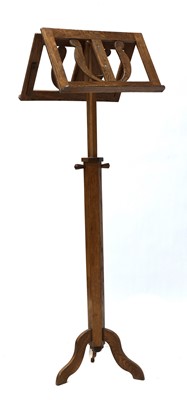 Lot 96 - An Arts and Crafts oak duet stand