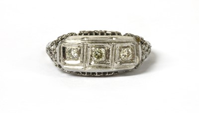 Lot 43 - An American white gold three stone diamond ring