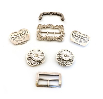 Lot 64 - A collection of four silver belt buckles
