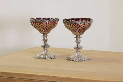 Lot 355 - A pair of Victorian silver combination candlestick tazzas