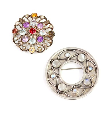 Lot 80 - A silver Arts & Crafts moonstone circle brooch