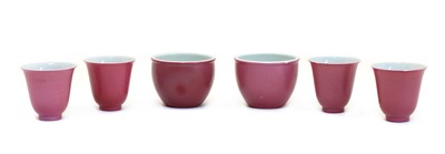 Lot 102 - A collection of four Chinese pink glazed cups