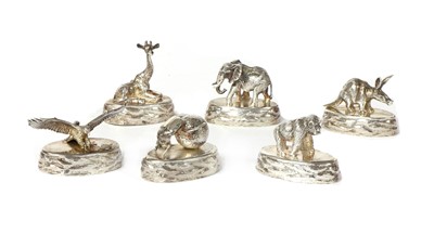 Lot 1319 - A set of six solid animal silver place card holders, by Patrick Mavros