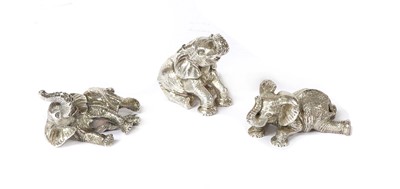 Lot 1315 - A set of three silver sculptures of elephants playing, by Patrick Mavros