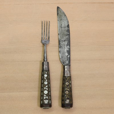 Lot 191 - A steel knife and fork