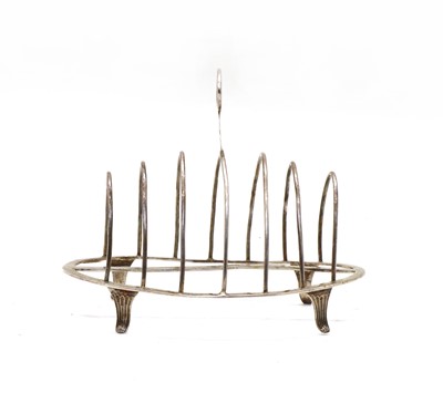 Lot 67 - A George III silver seven bar toast rack