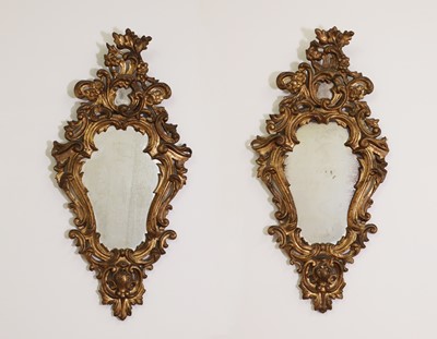 Lot 80 - A pair of rococo wall mirrors