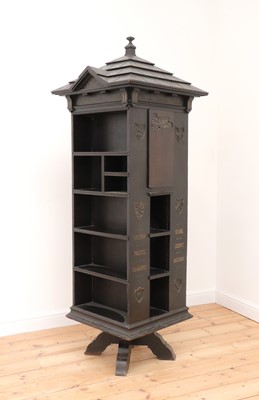 Lot 234 - An American 'Tabard Inn Library' ebonised oak revolving bookcase