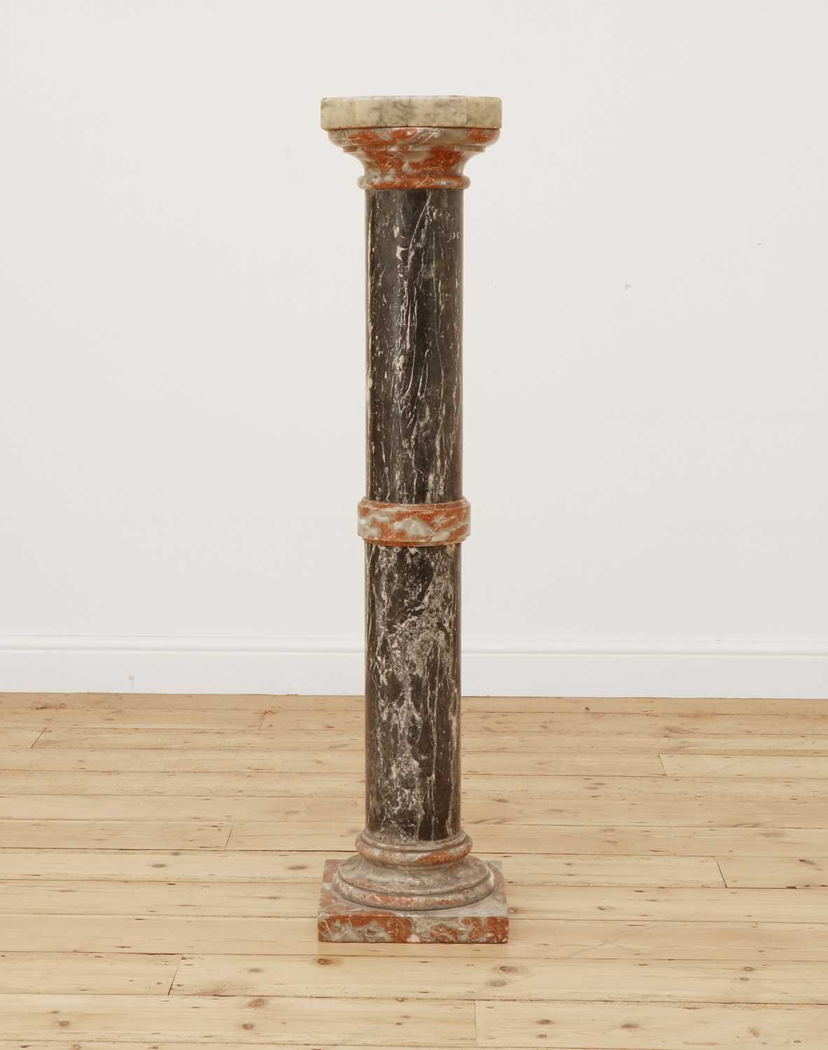 Lot 68 - A Continental black and red marble plinth