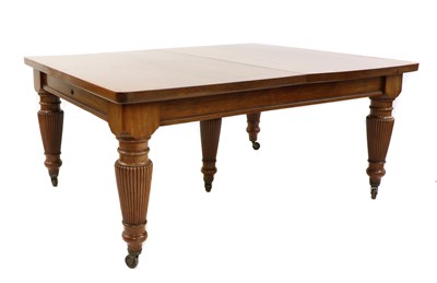 Lot 262 - A large late Victorian walnut wind-out dining table