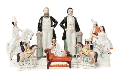 Lot 127 - A group of twenty of Staffordshire stoneware figurines