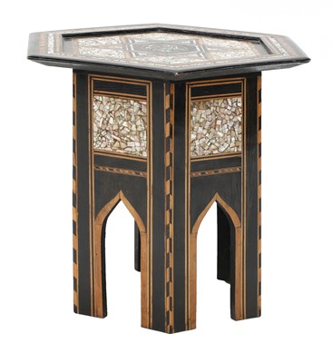 Lot 35 - An ebonised Damascene coffee table