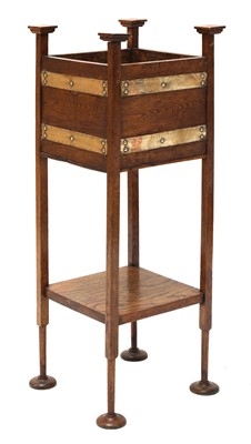 Lot 95 - An Arts and Crafts brass-bound oak planter