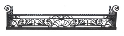 Lot 101 - A Cotswold School wrought steel fender