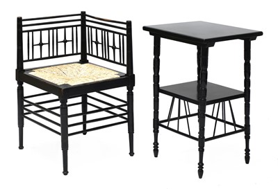 Lot 44 - An ebonised Liberty & Co. 'Argyll' corner chair