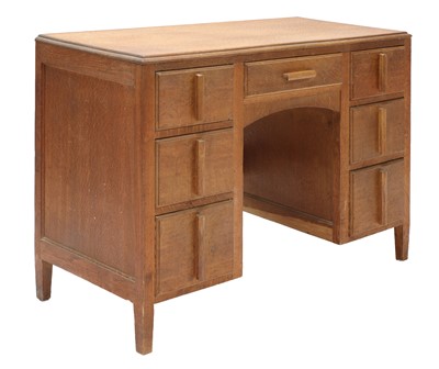 Lot 90 - A Cotswold School oak kneehole desk