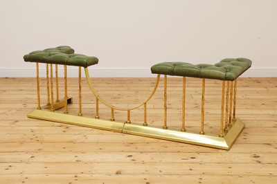 Lot 222 - A brass club fender