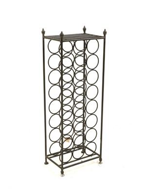 Lot 286 - A cast iron floor standing wine rack