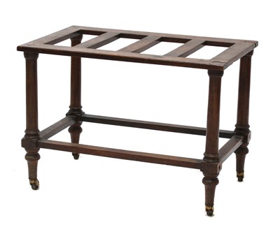 Lot 355 - A mahogany luggage stand