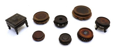 Lot 93 - A collection of Chinese wood stands