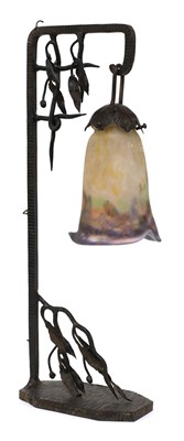 Lot 264 - A Muller Frères glass and wrought iron table lamp