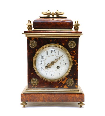 Lot 270 - A gong strike faux tortoiseshell bracket clock