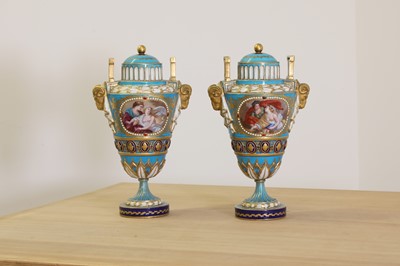 Lot 388 - A pair of Sèvres-style vases and covers