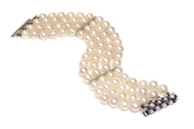 Lot 312 - A four row cultured pearl bracelet
