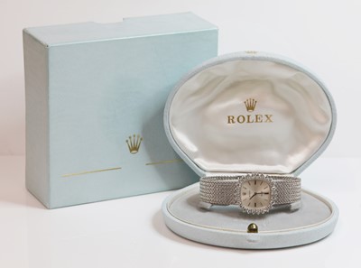 Lot 262 - A ladies' 18ct white gold diamond set Rolex 'Orchid' mechanical bracelet watch
