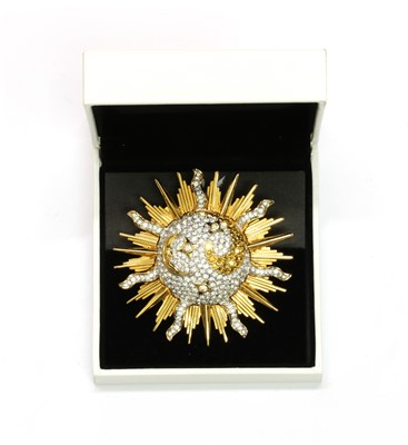 Lot 268 - A Swarovski gilt metal celestial brooch