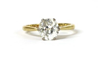 Lot 1166 - A gold single stone diamond ring