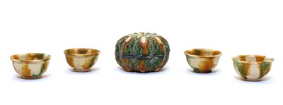 Lot 151 - A Chinese sancai-glazed earthenware box and cover