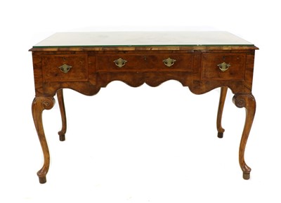 Lot 282 - A George II style walnut side table