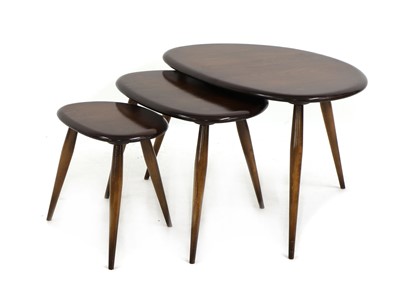 Lot 359 - A nest of Ercol 'Pebble' beech and elm tables