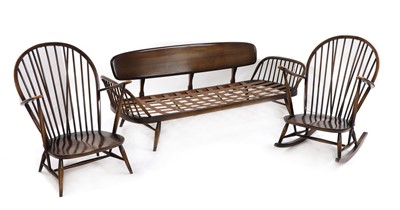 Lot 378 - An Ercol beech and elm settee