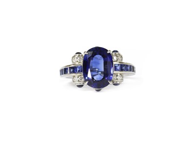 Lot 1282 - A sapphire and diamond ring