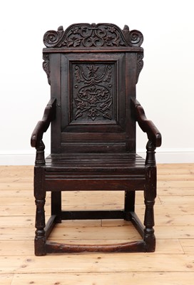 Lot 406 - An oak wainscot armchair