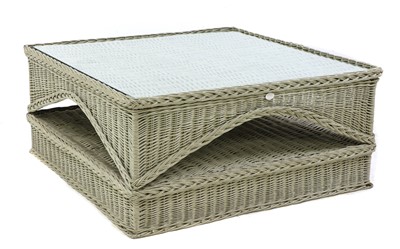 Lot 333 - A glass top wicker coffee table